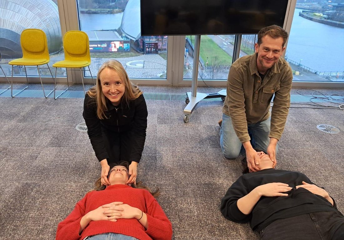 First Aid Training On Site instructor leading a hands-on first aid session at a client workplace